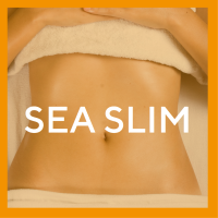 A bright orange background, the words sea slim across the toned torso of a woman draped for a body treatment